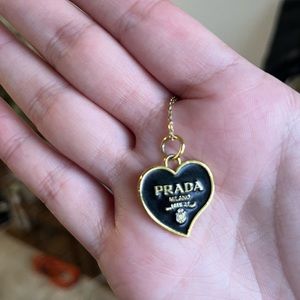 Heart shaped necklace on gold chain